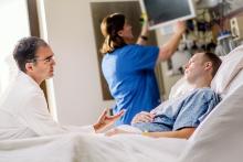 Dr. Zomorodi with a patient